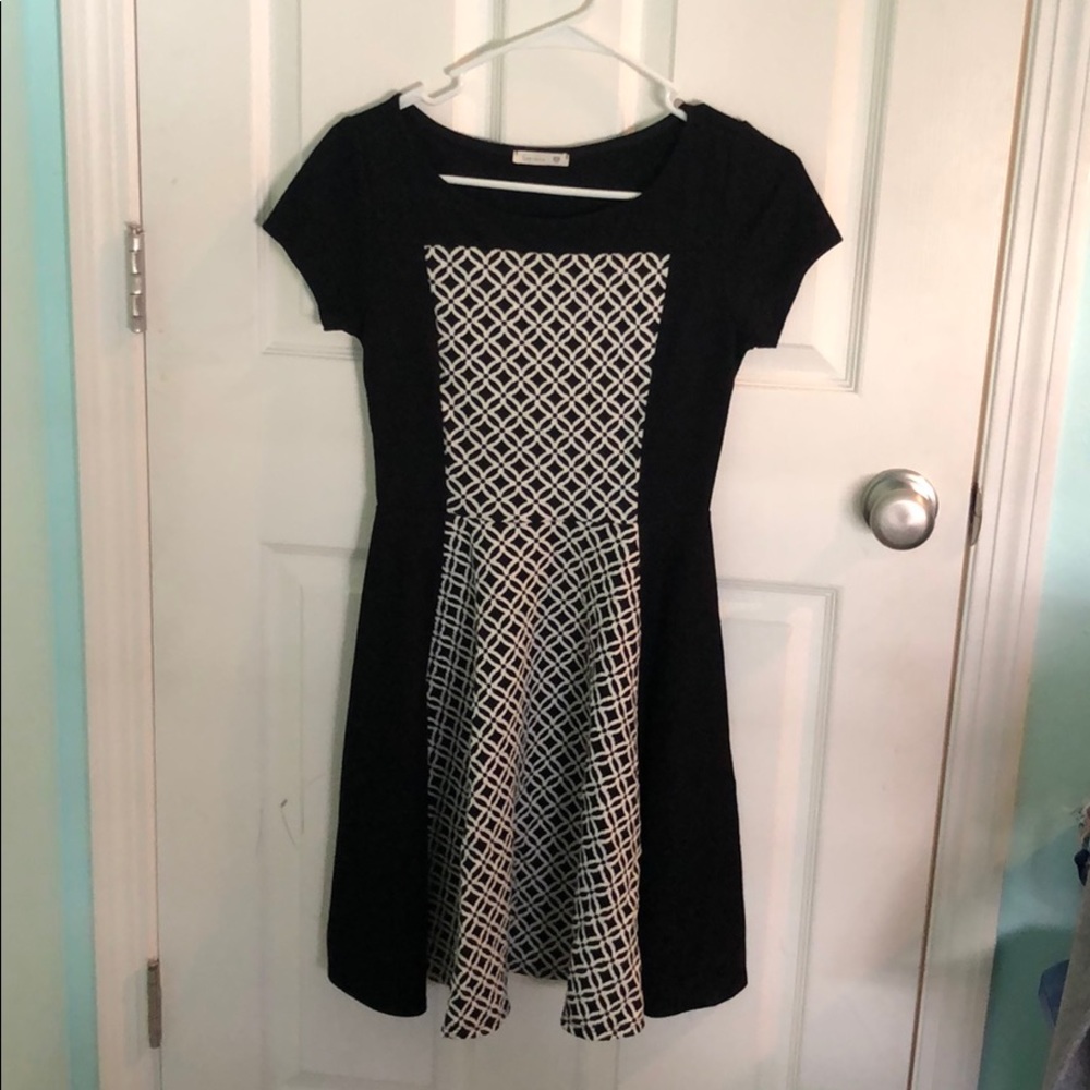 Black dress with embodiments